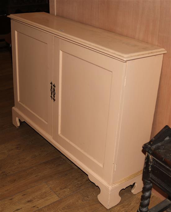 A George III and later cream painted enclosed bookcase W.126cm